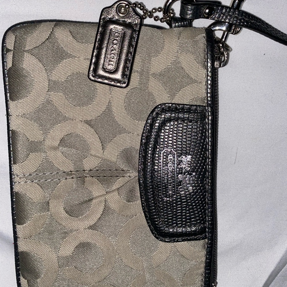 Couch gray silver like new wristlet bag